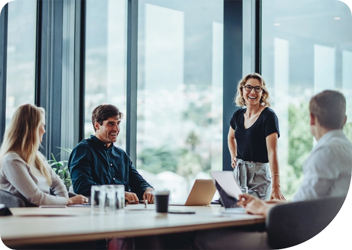 Team holding a meeting together