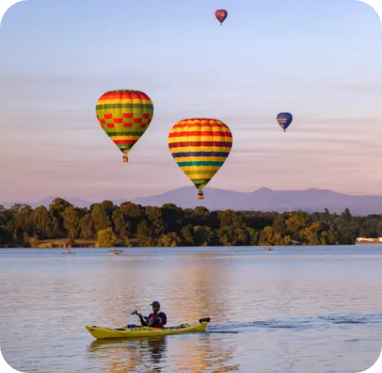 Hot air balloons over the Canberra lake