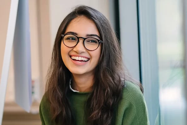young south asian woman smiling