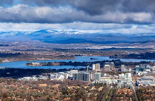 Canberra CBD with snowy mountains in the background